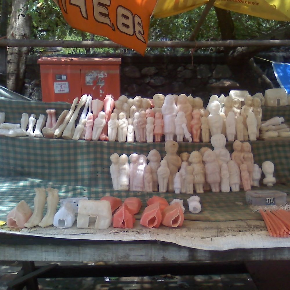 Candles_shaped_like_dolls%2C_limbs%2C_houses--Mount_Mary_Church%2C_Mumbai.jpg