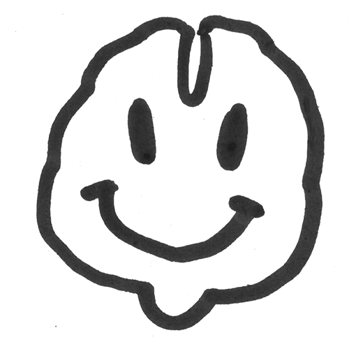 Hand-drawn smiling face on paper