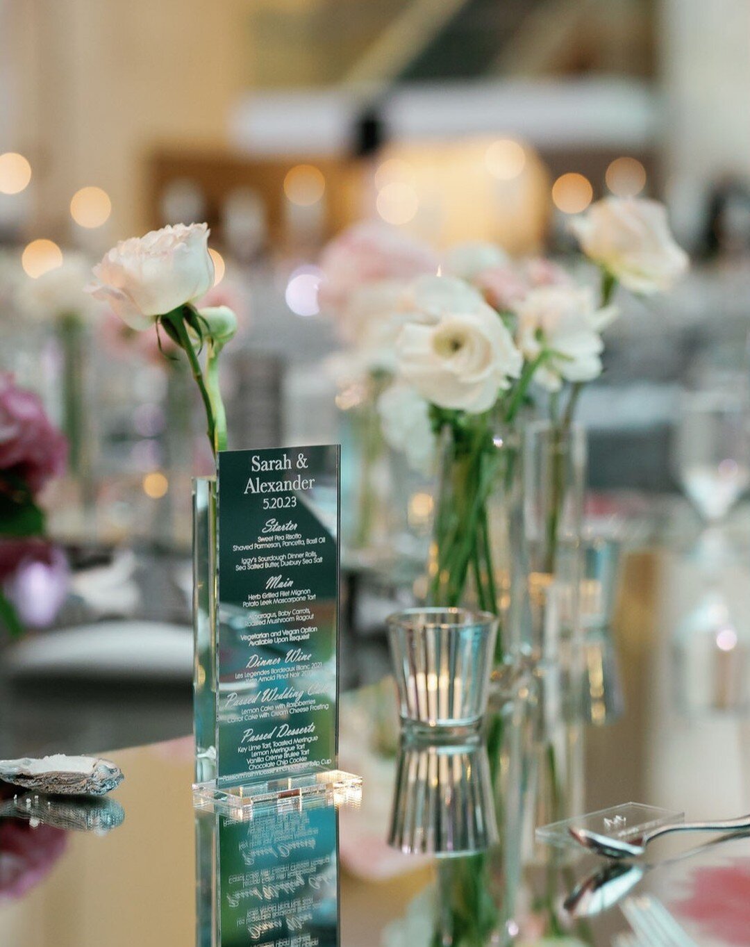 Such a beautiful way to display your wedding day menu table side. 💕 Made from 1/8&quot; silver mirror acrylic with 1/4&quot; clear acrylic stands. #weddingdayready #weddingdecor #luxurywedding #bostonwedding #thebestdays #weddingevents #weddingtoday