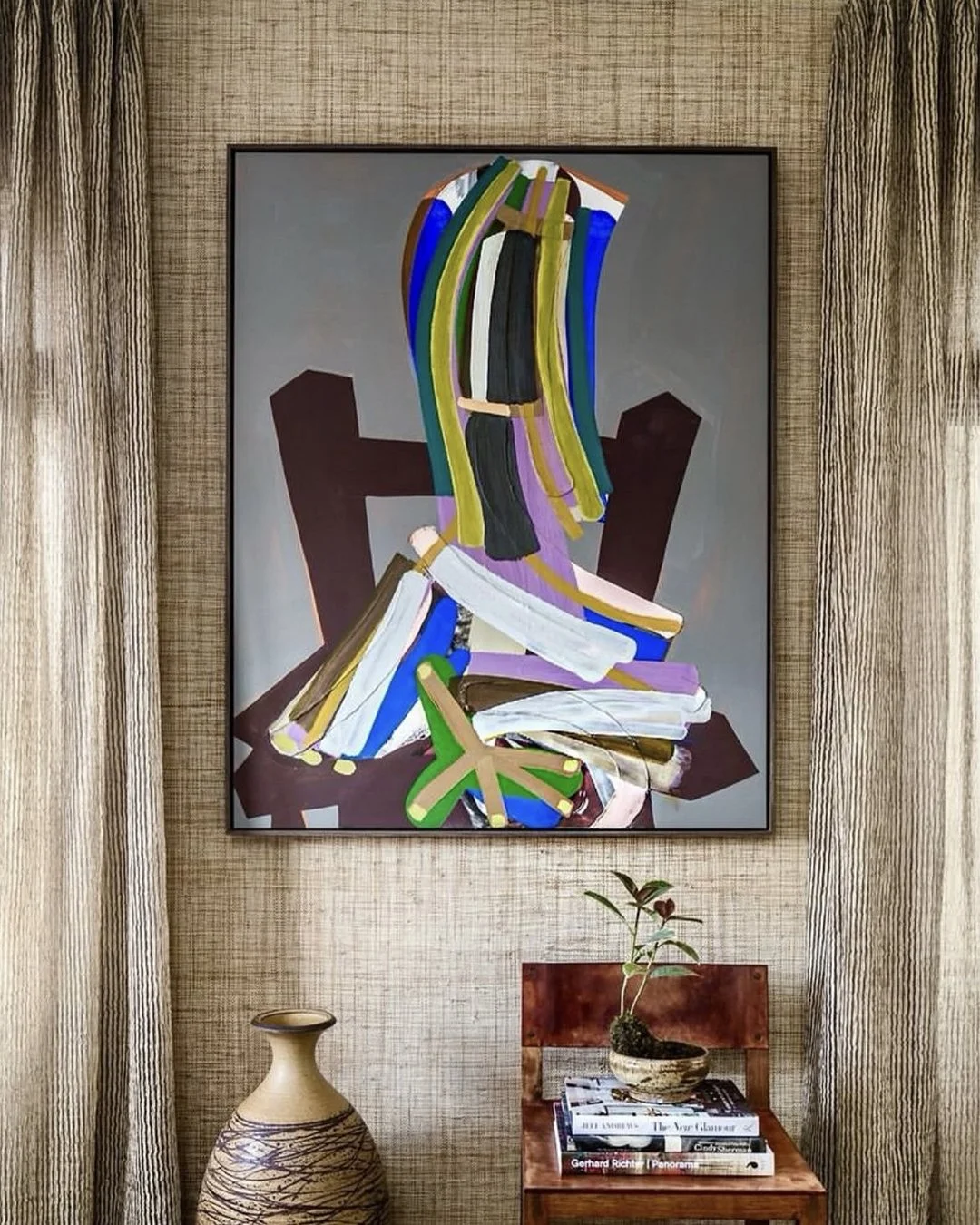 John Millei’s Woman in a Chair displayed in a minimalist private interior in France