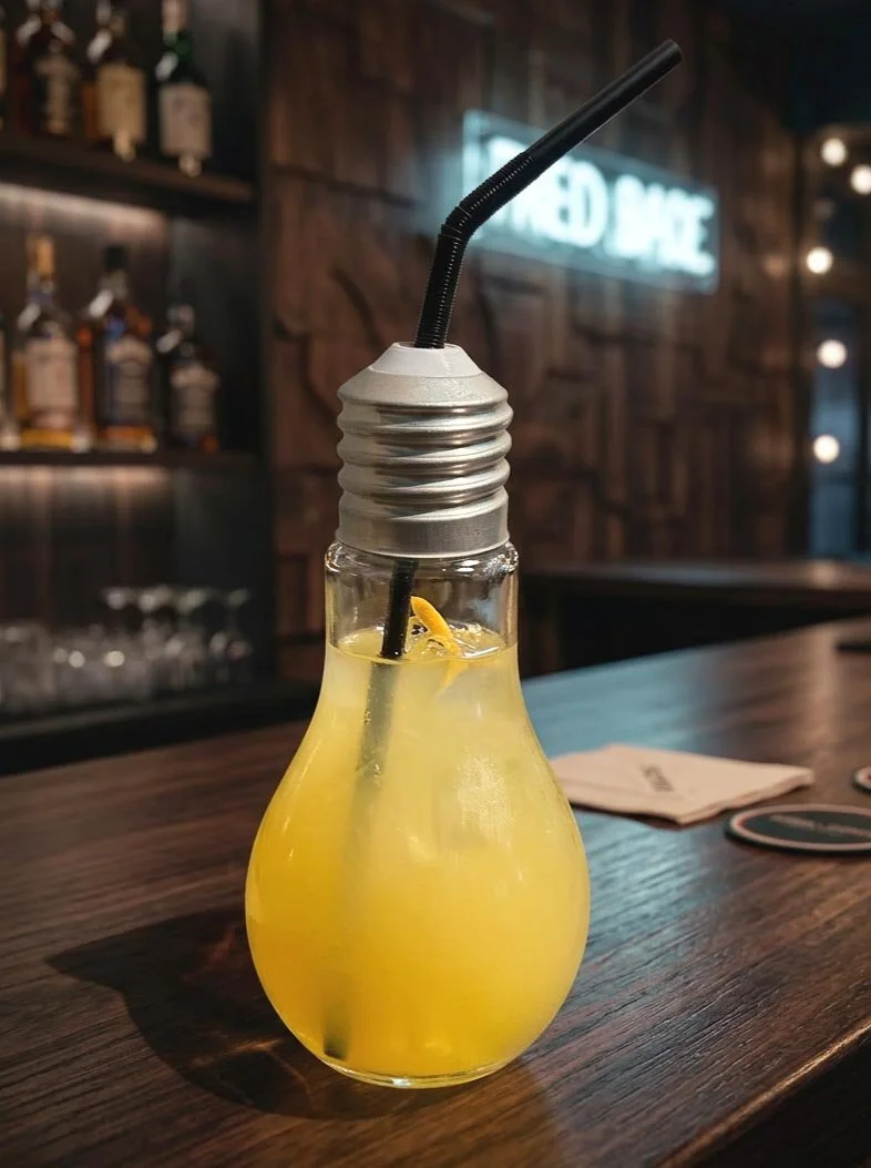 LARGE-LIGHT-BULB-WITH-SILVER TOP IN BAR SETTING 2.jpg