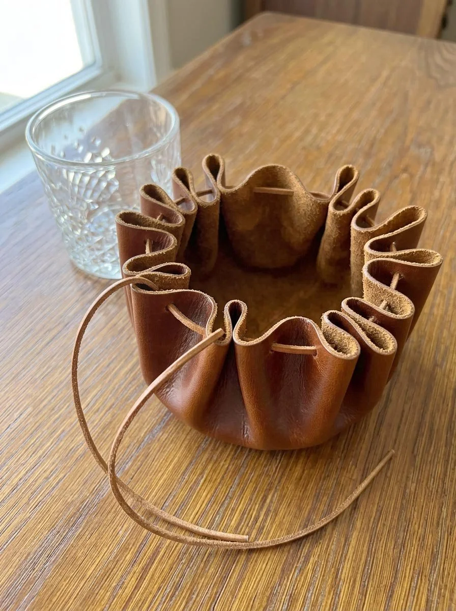 TAN LEATHER OUTLAWS POUCH WITH GLASS ABOVE VIEW EMPTY.jpg