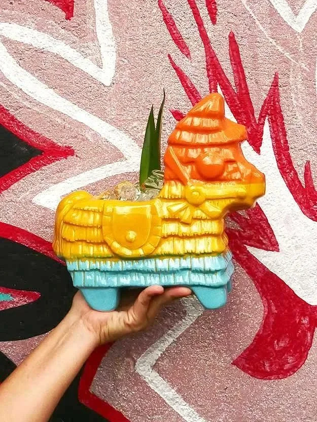 PINATA-COCKTAIL-SHARER-HAND-HELD.jpg