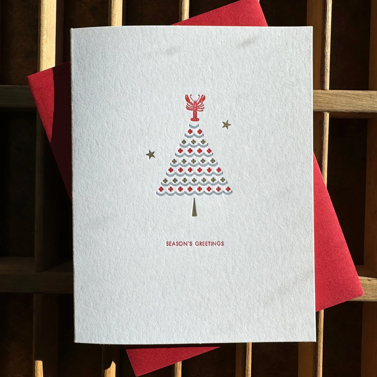 Season's Greetings Lobster Tree Topper