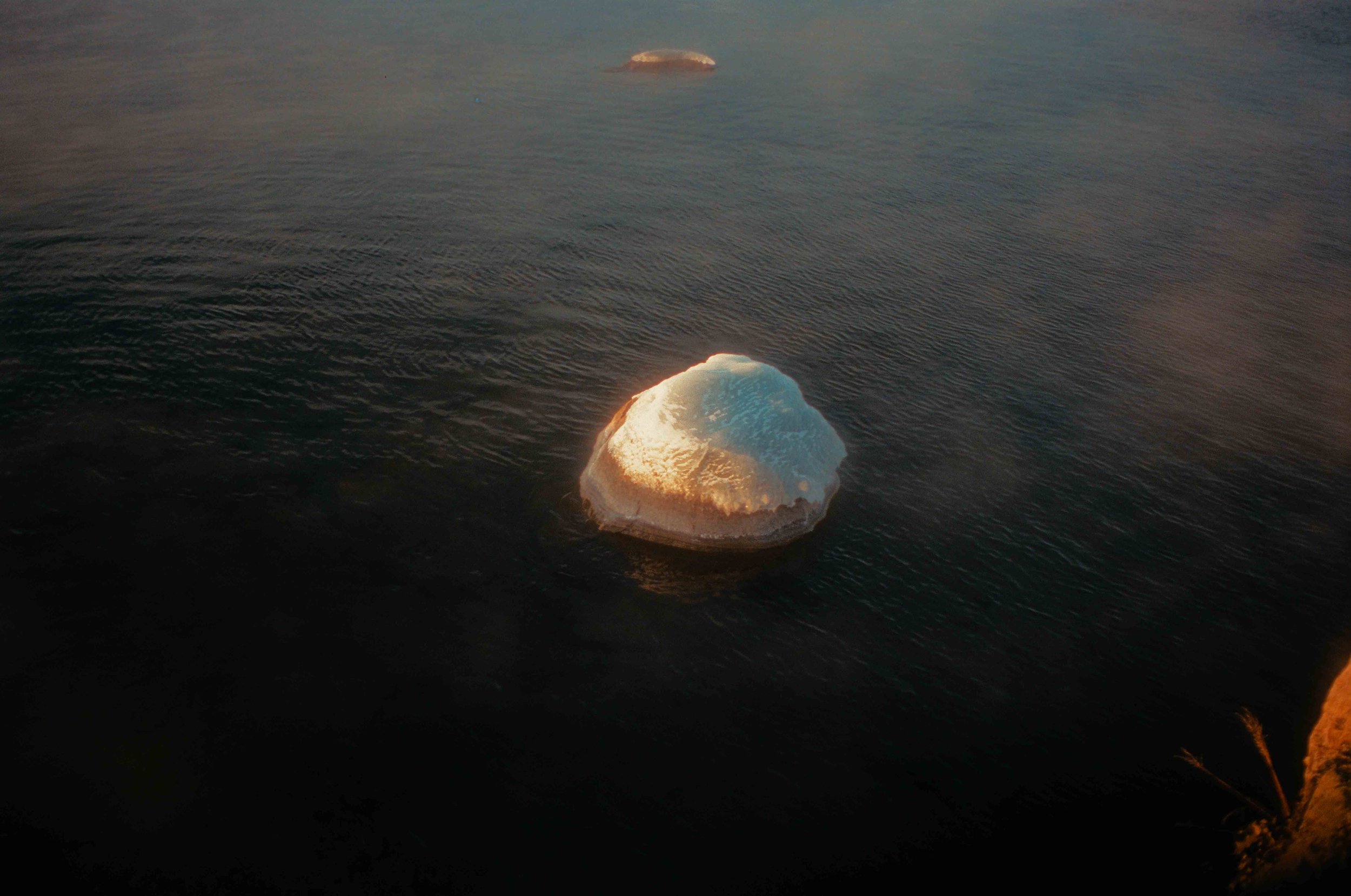 Dramatic Winter sea smoke sunrise at Split Rock Lighthouse on Lake Superior, Minnesota
