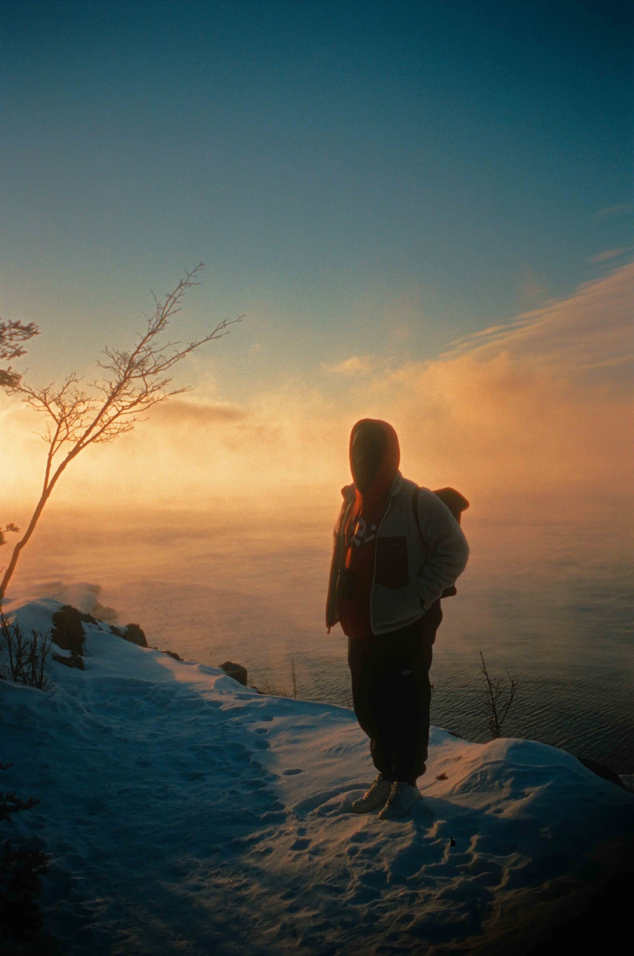 Dramatic Winter sea smoke sunrise at Split Rock Lighthouse on Lake Superior, Minnesota