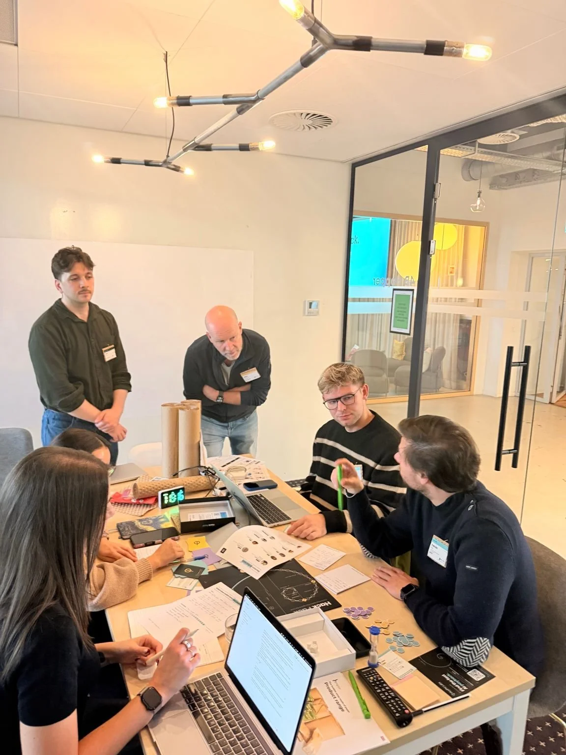 The team developing its AI packaging redesign concept at H/Pack for 2030 in Amsterdam