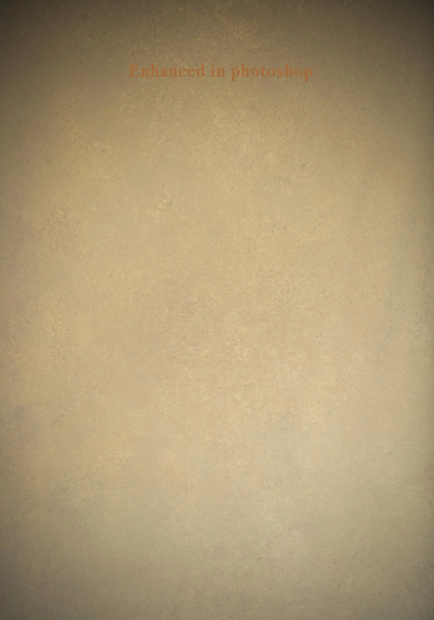 A beige-colored page with the text 'Enhanced in photoshop' written in the upper middle section in orange font.