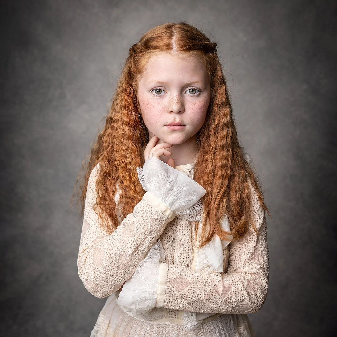 Child portrait photography by Suzanna, using a grey hand painted canvas backdrop by Hand Painted Backdrops UK.