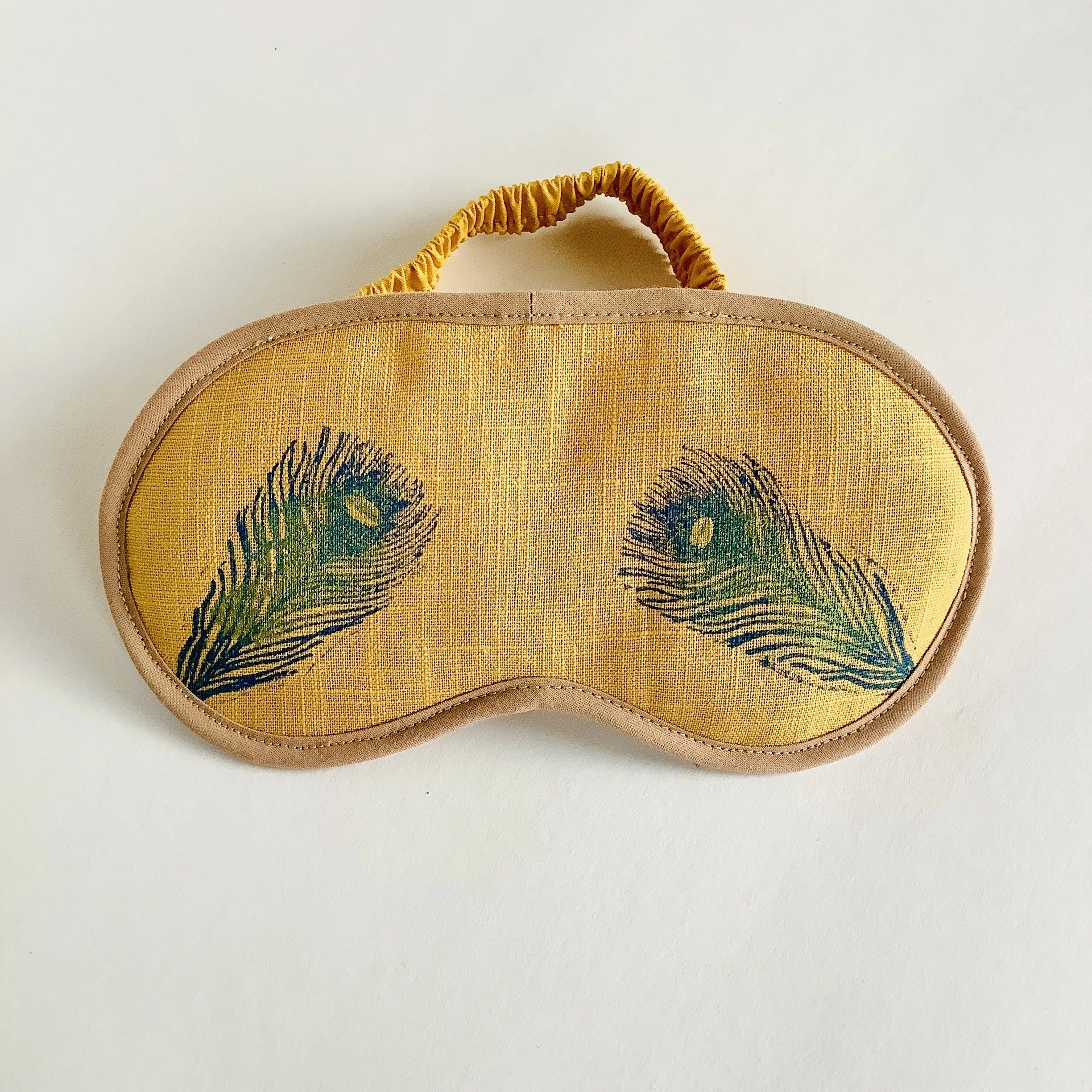 Yellow Linen Peacock Feathers eye mask.jpg