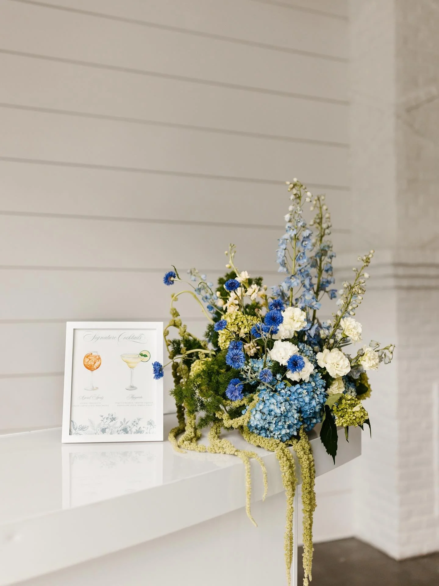 The bar always deserves a little drama!!

A fave bar piece this year, for a styled shoot on a rainy June day 🌀💙💦

Venue: @thehuttonhouse 
Planning &amp; Design: @hannamarieevents 
Photography: @lexiryanphoto 
Content Creation: @somethingbluecreati