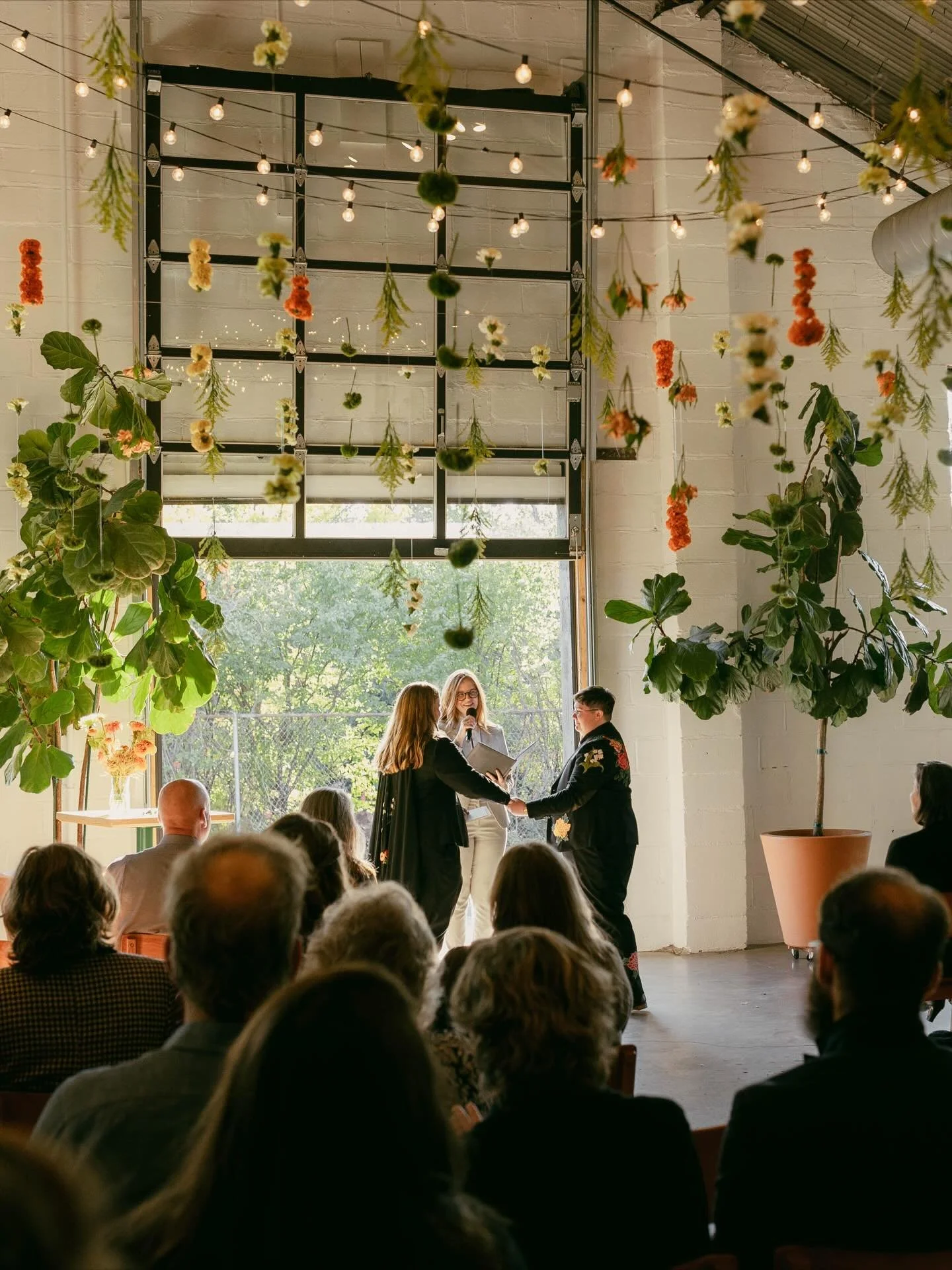 There&rsquo;s something so magical about @paikkamn 🤩 and this glorious day in October did not disappoint!

Cedar + Nic had a vision of colorful stems hanging above them throughout their wedding, which I was so stoked about. They both saw the install