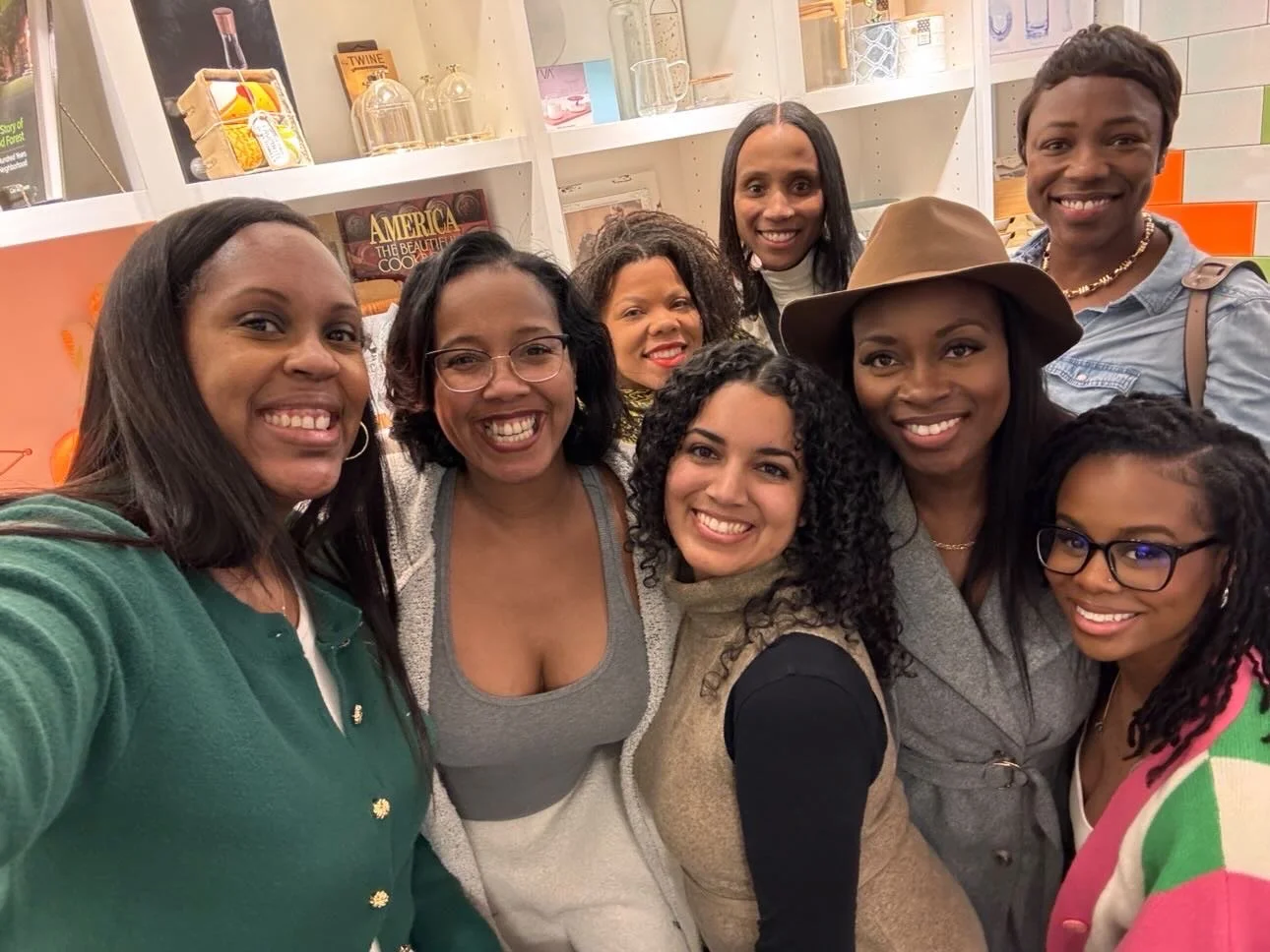 Guests enjoying a hands-on cooking class at The Kitchen by Cooking with Que in Detroit