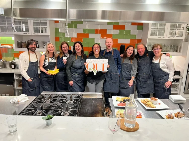 Gathering at The Kitchen by Cooking with Que private event venue