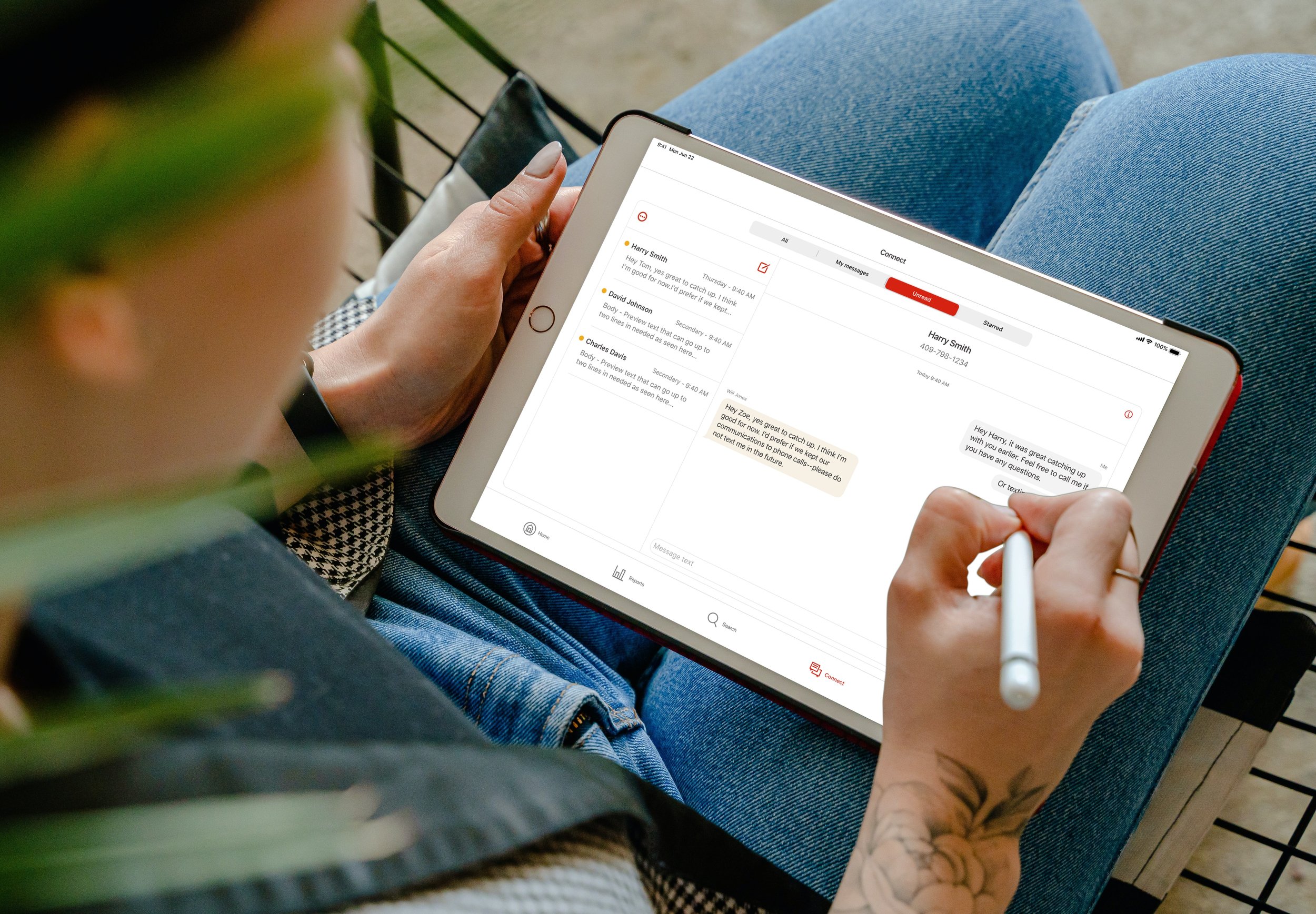 Unread iPad Mockup - Male on chair.jpg