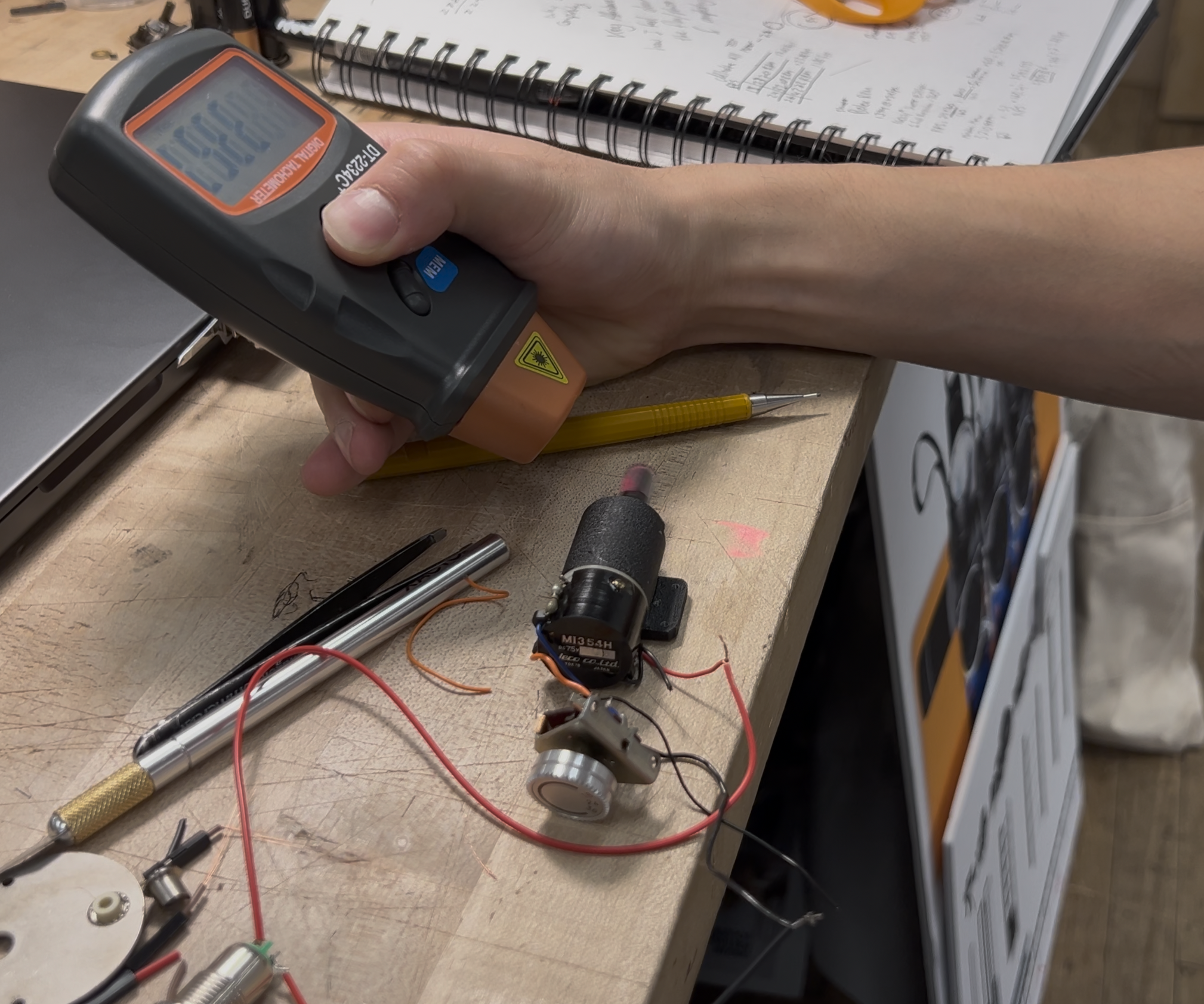 using a tachometer to find the motor rpm and calculate the gear ratios for a 24 fps video