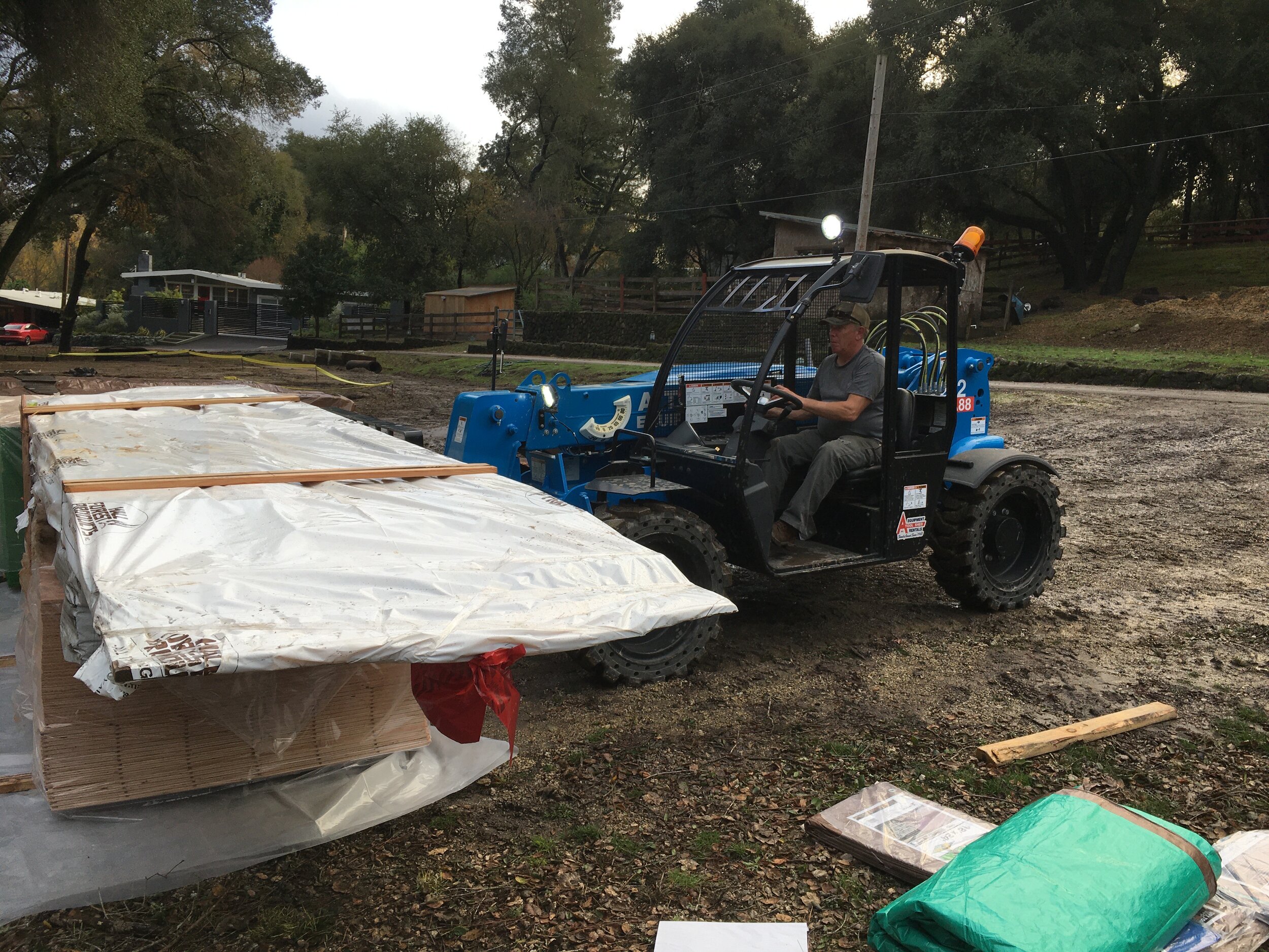Stacking and tarping.