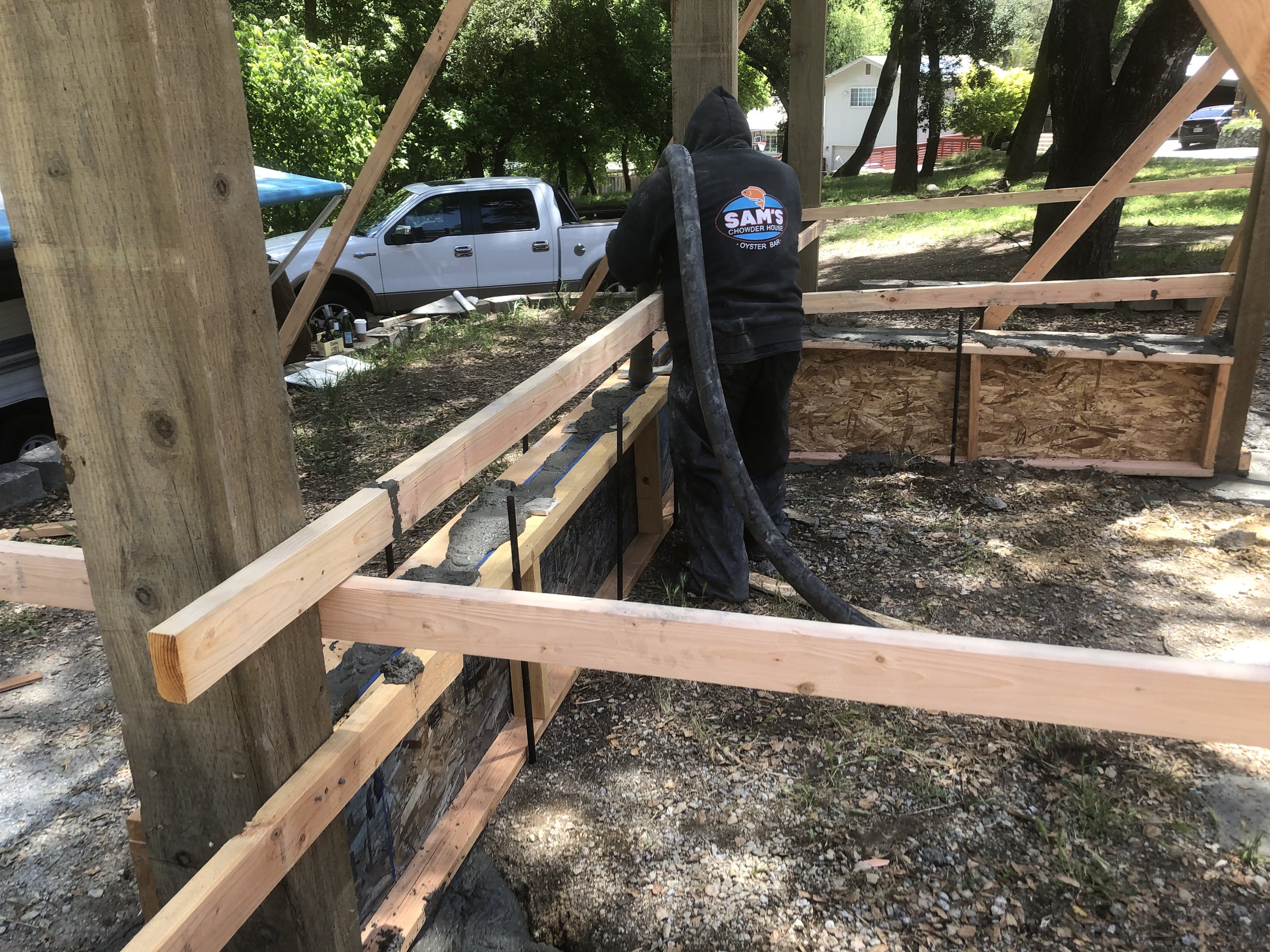 Pumping the concrete! We added fiberglass flakes for extra strength.
