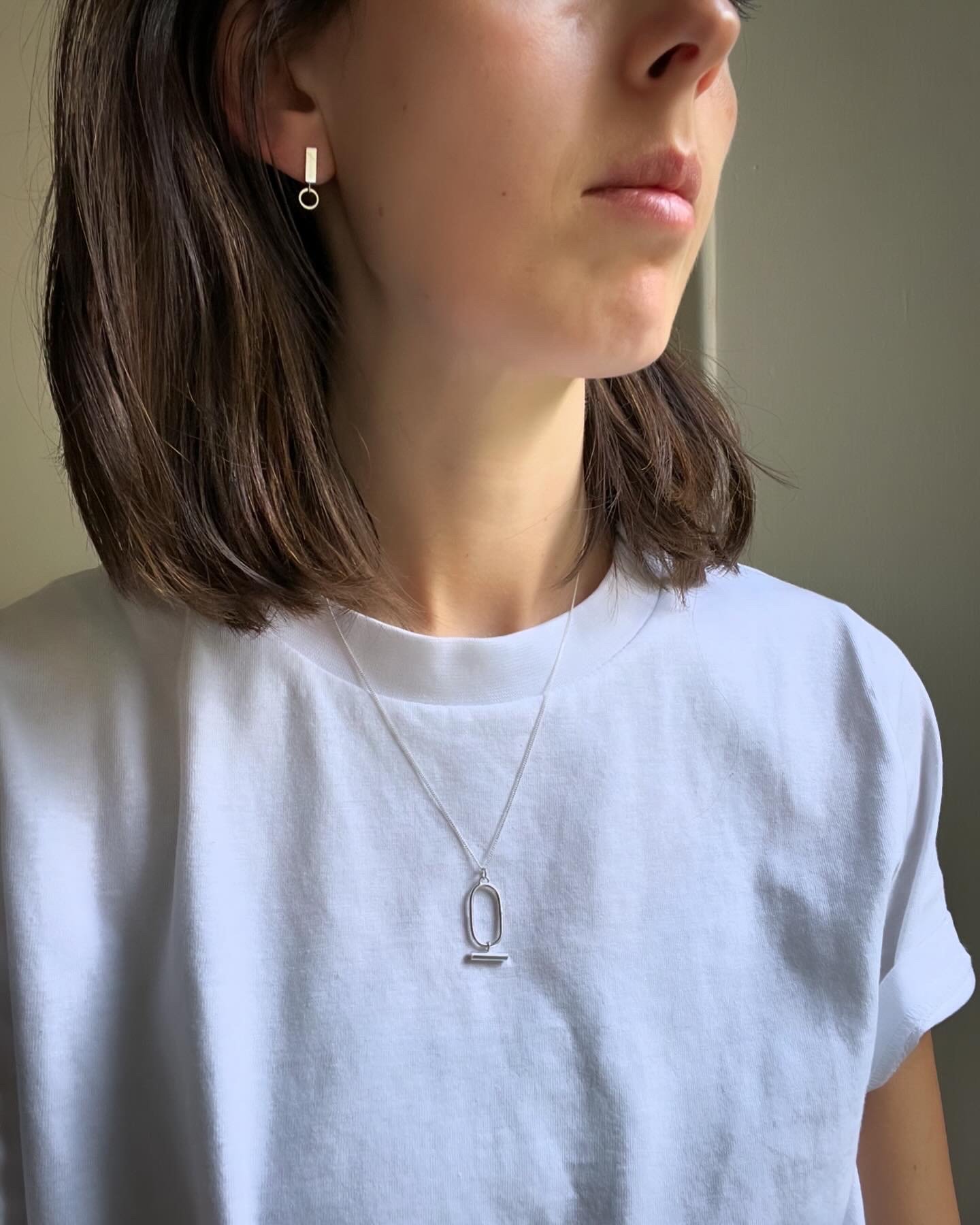 Oval and Bar pendant - on model.jpeg