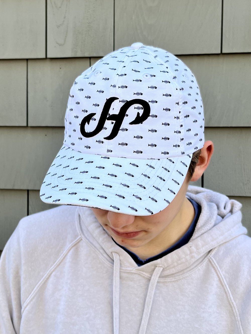 White hat with fish design — J Hook Clothing Company