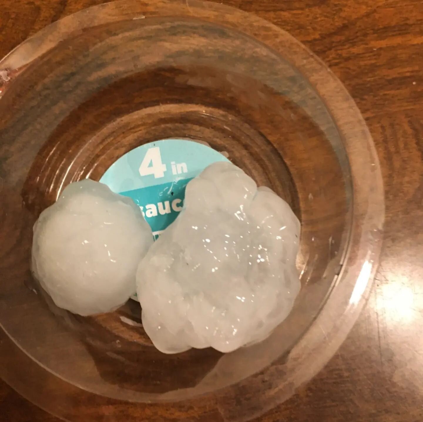 Some big hail hit the metro today. First photo from my mom's condo in WDM and the other is at my house in Merle Hay hood. I cringe thinking of tattered leaves. But Patrick put it into perspective: first save the kitties (they came in just ahead of th
