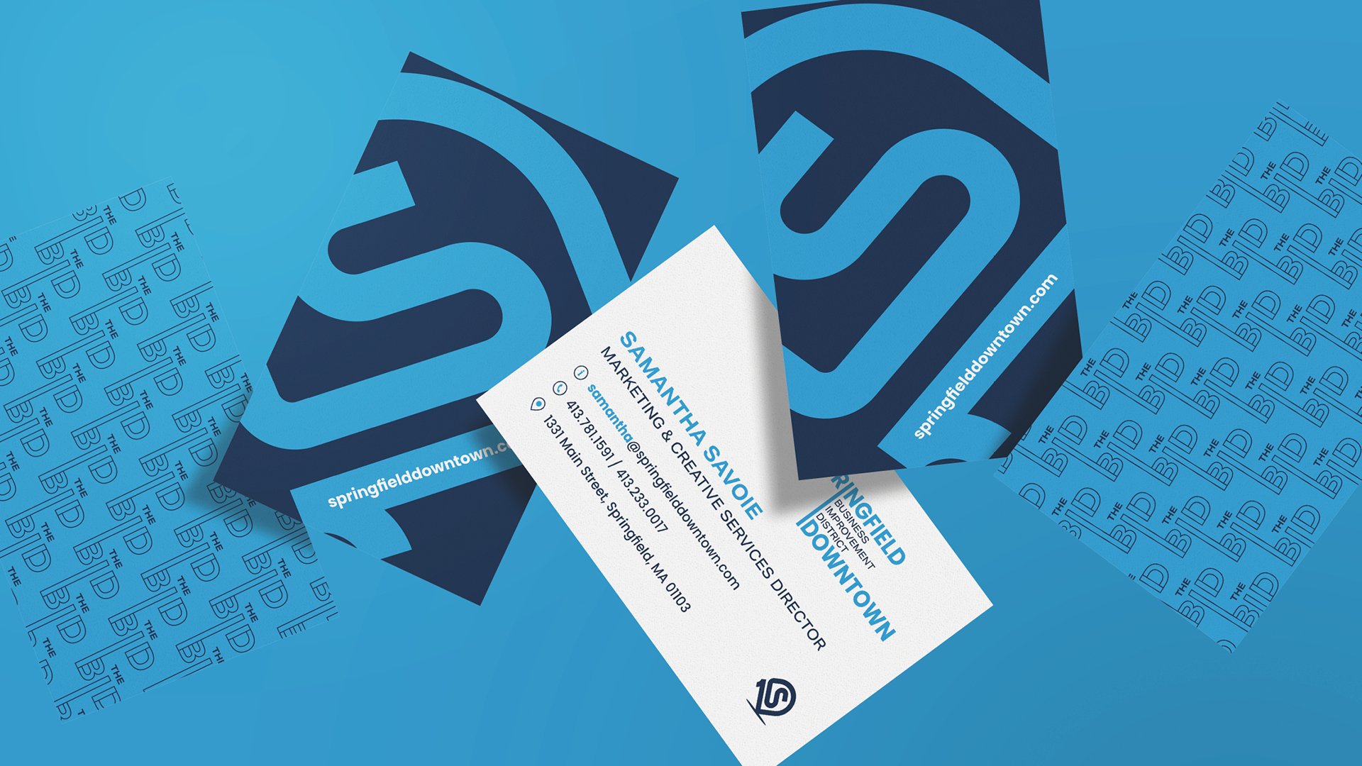 Business cards floating on blue background