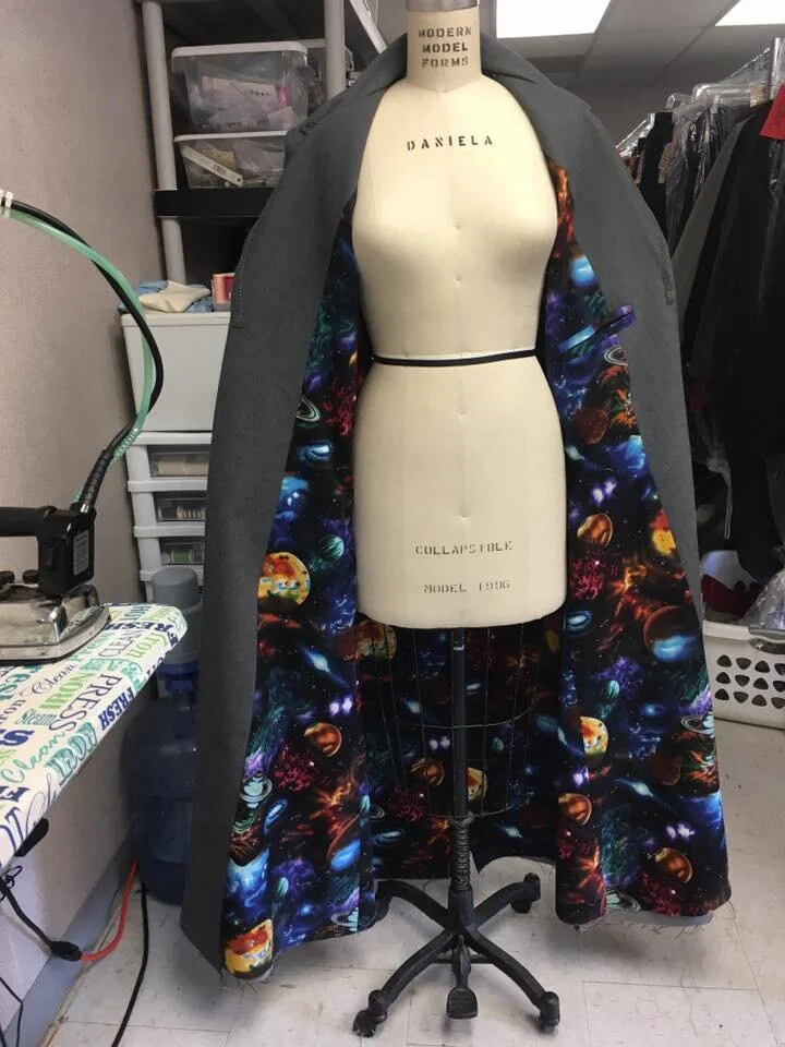 a Dr. Who Inspired coat complete with universe lining.