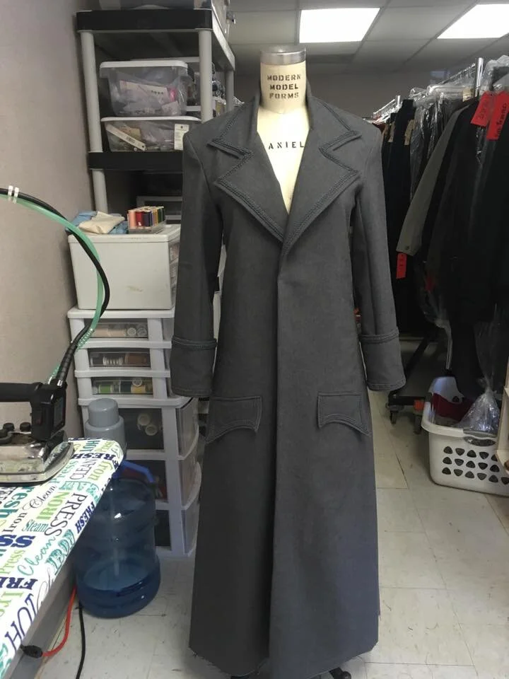 a Dr. Who Inspired coat complete with universe lining.