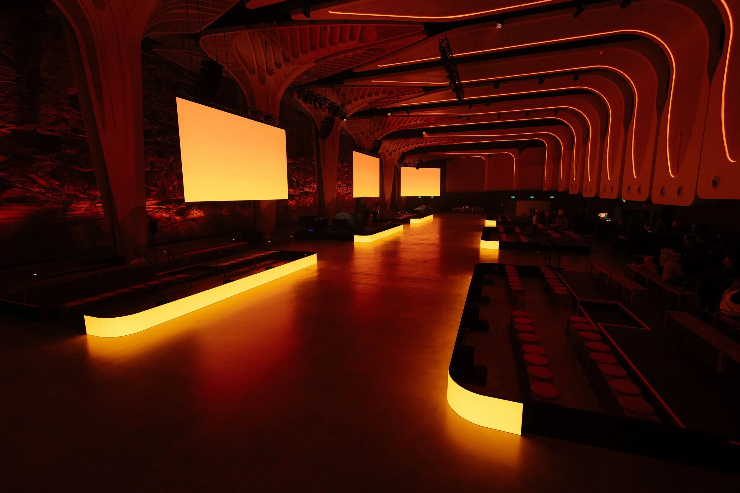 The Cutaway set up for the Geely EX2 launch, with LED screens and lit seating platforms