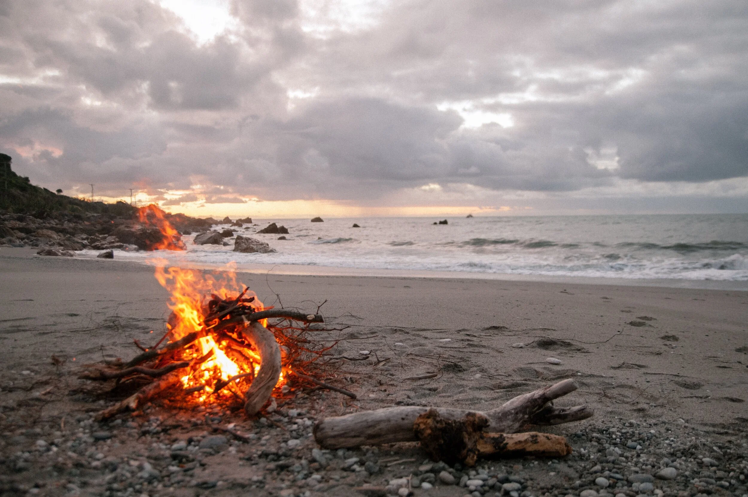Deadwood on fire on beach west coast NZ IC Delphine Ducaruge 10.3.2020.jpeg