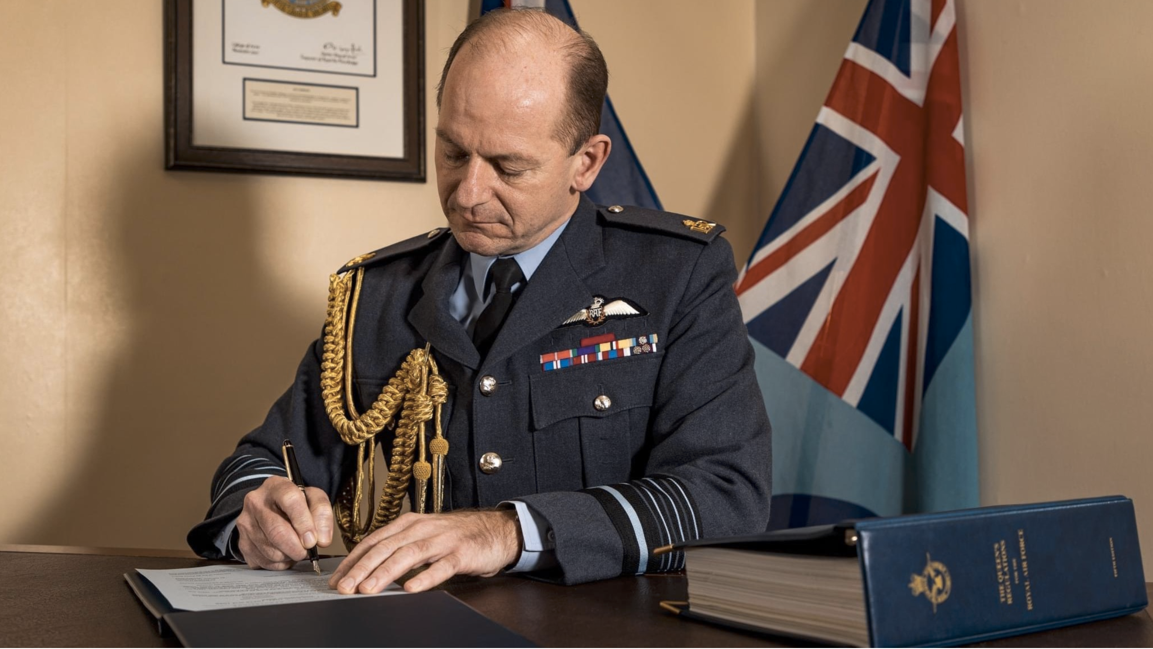 RAF Head of RAF formally signs King's Regulations