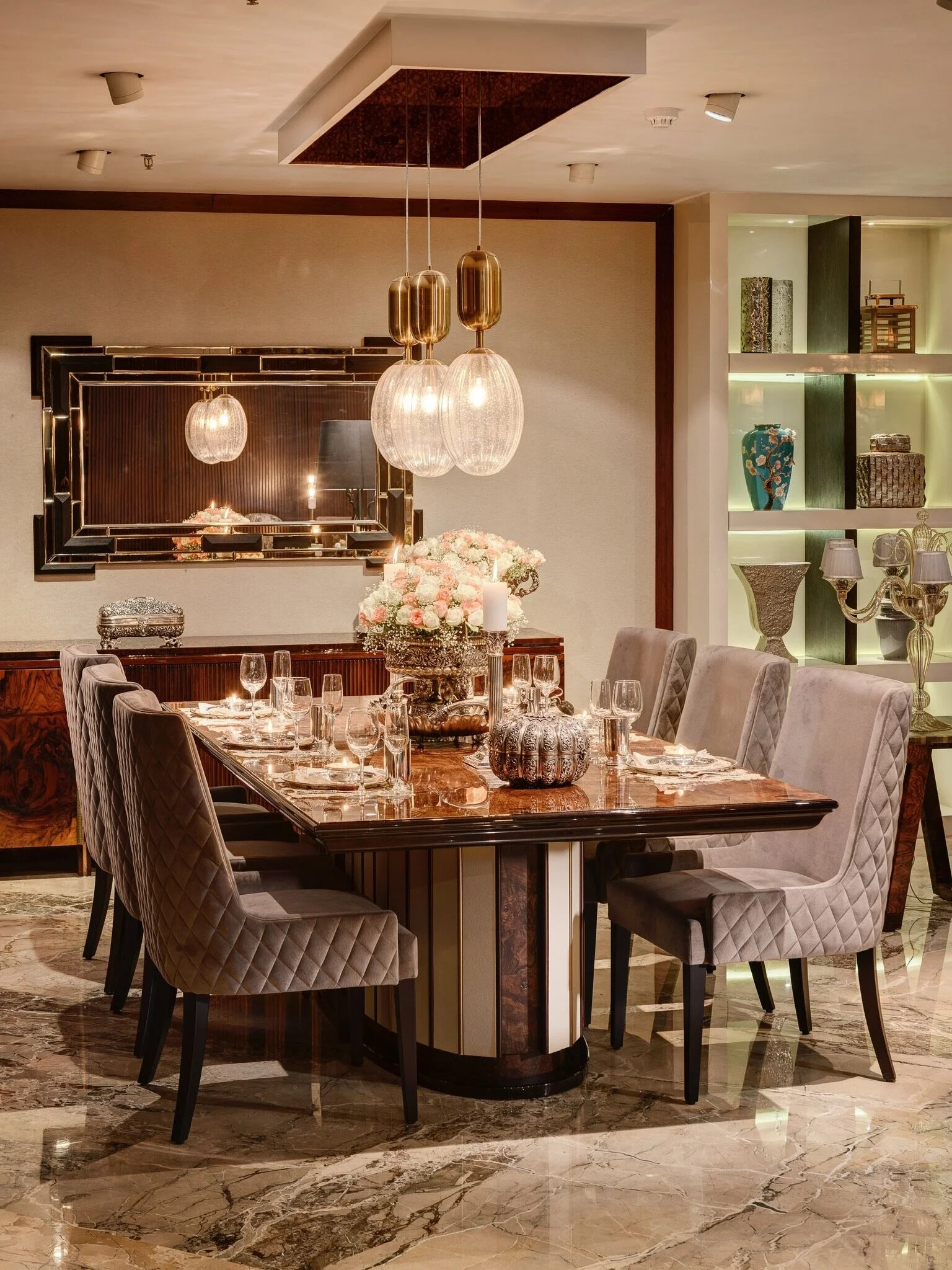 Finally coming to the dining table, this is where you can host your most formal look. Vintage chandni silver tableware creates a gorgeous, traditional aesthetic for celebratory dinners. Mix silver plates and decorative vases or urns with contemporar…