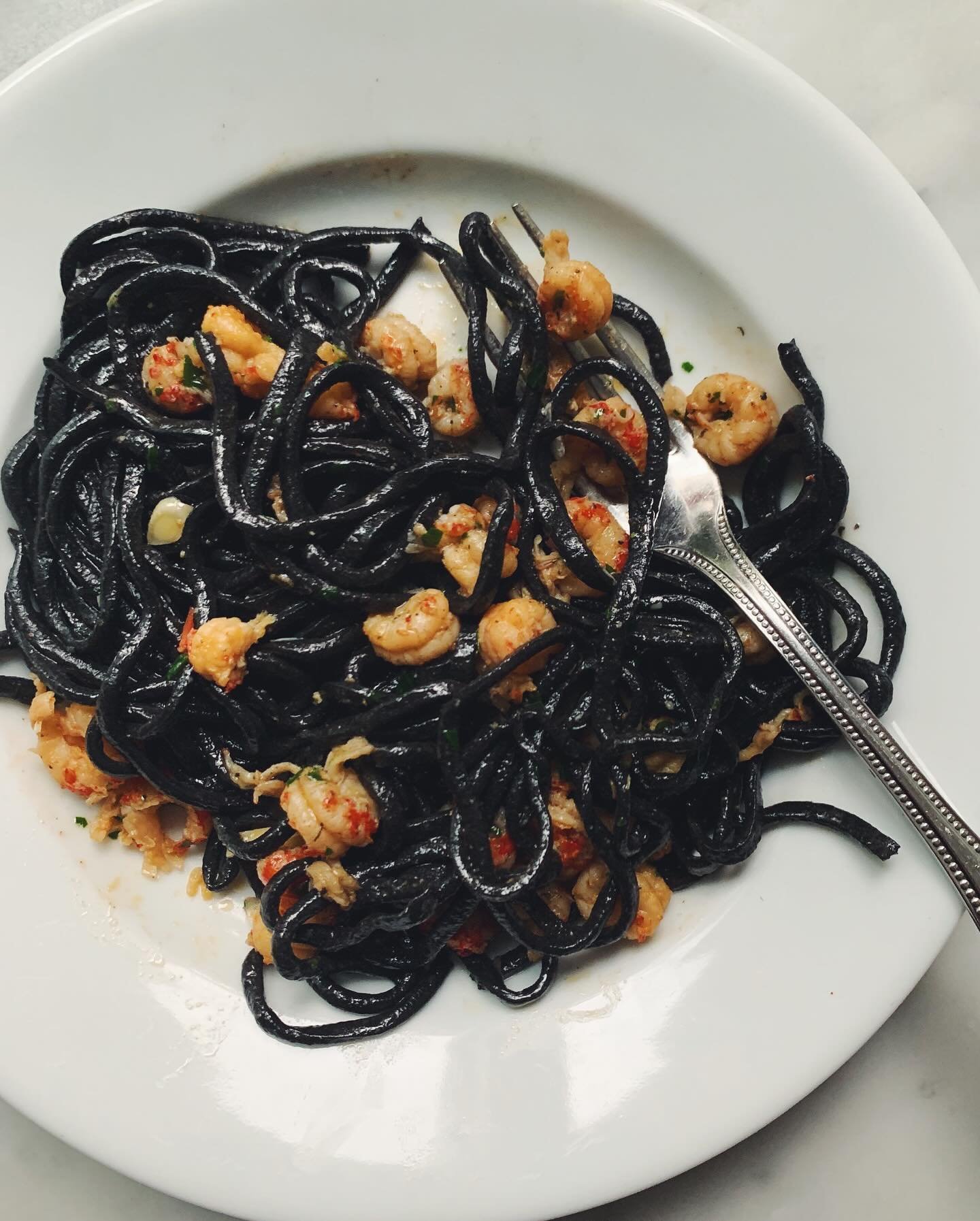 My kid @nickvance_birds made the cuttlefish 🦑 ink pasta from The Glorious Pasta of Italy 🇮🇹 In the book, the recipe is dressed with crab 🦀 rag&ugrave;. He used crawfish 🦞and it was 🔥🖤
.
Process video in my stories 🦑
.
.
.
#chitarra #spaghetti