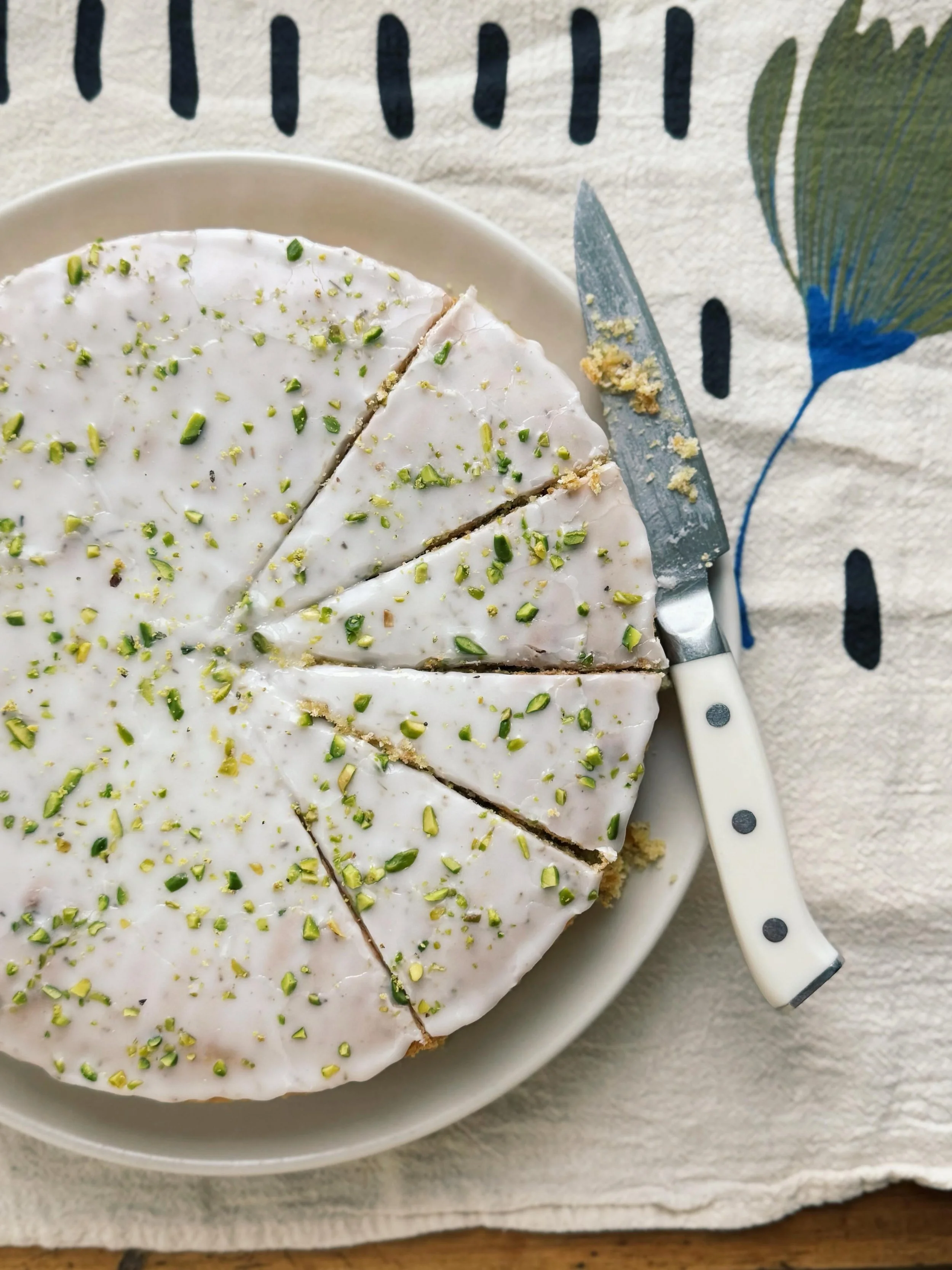 Fennel pollen pistachio cake, resting on a pretty tea towel from @lineandnest ✨
.
Recipe for the cake coming in tomorrow&rsquo;s Buona Domenica. It has a lovely compact (but not dense) tender crumb, and the fennel flavor is mellow rather than asserti