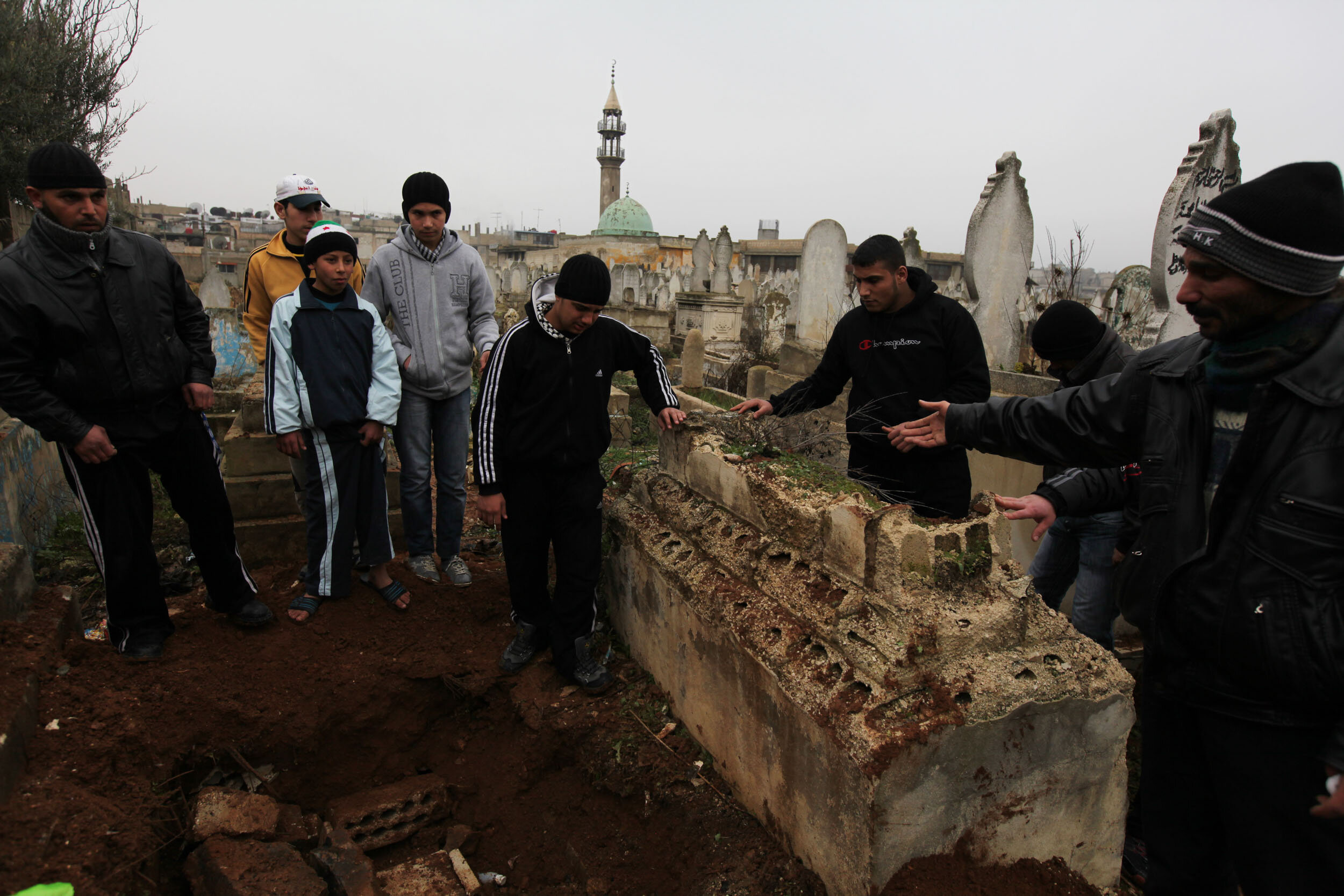  Βurial of the young Mohammed Nour Hassan Agha, Bab Drib cemetery, Homs, Jan 26/2012. 