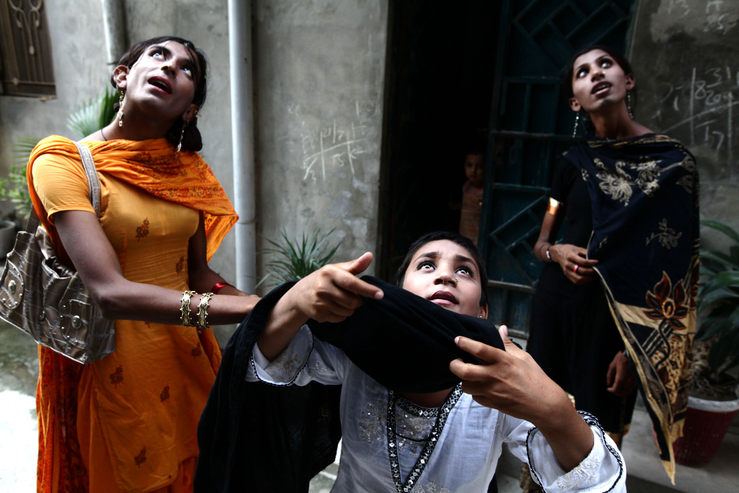  Transgenders -  Khusras  - receiving alms, Lahore, August 04/2011. 