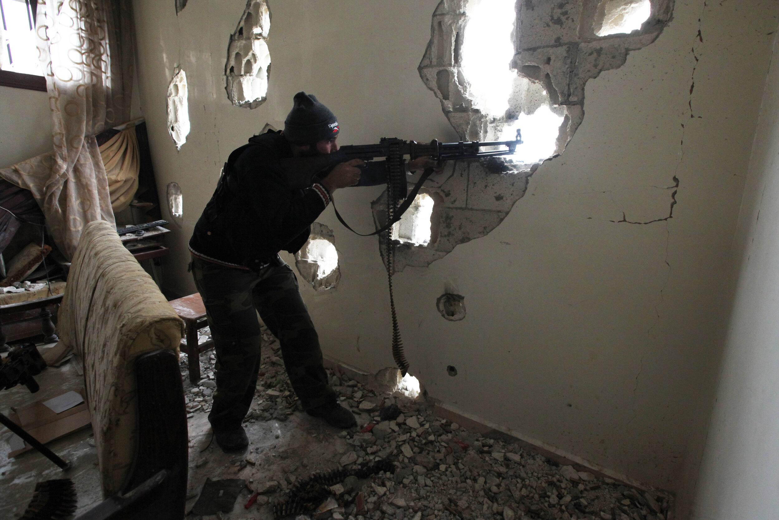  FSA fighter on the frontline, Baba Amer, Homs, Jan 23/2012. 