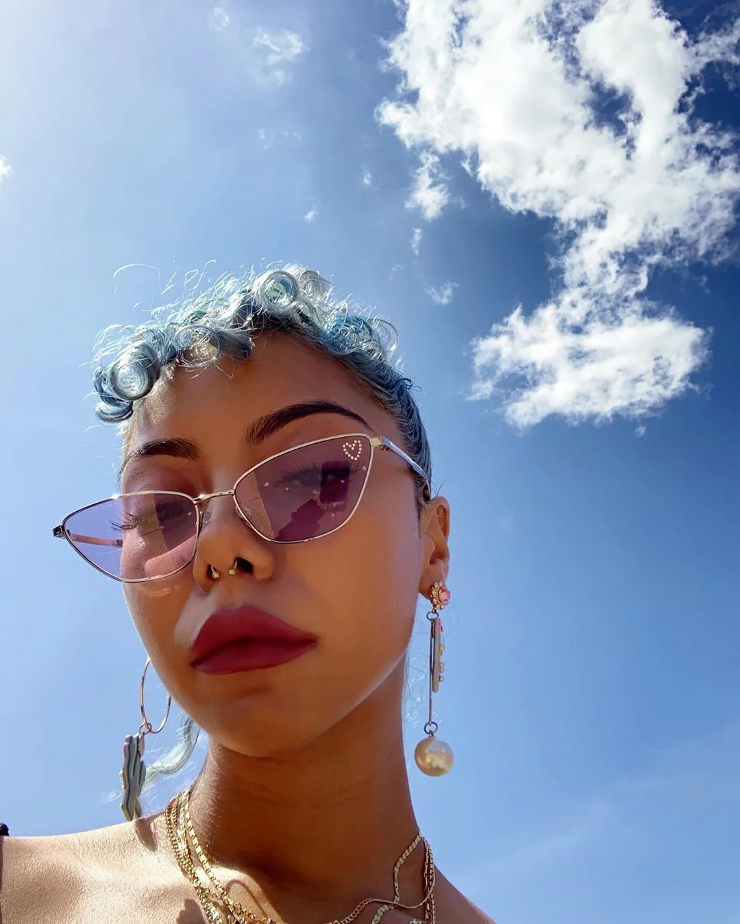 marcjacobs:

Alani Figueroa wearing the Retro Vintage Mini Cat Eye Sunglasses–– stop by our Madison Avenue boutique to make your own through May 19th. We have have glitter, crystal embellished and colored lenses to choose from. 