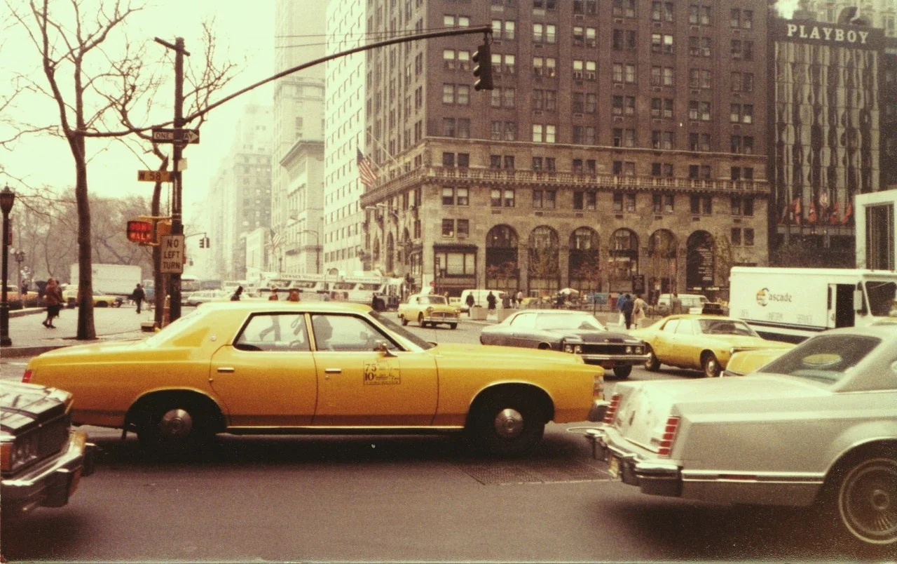 nycnostalgia:

58th Street, 1979. Playboy building in the background.