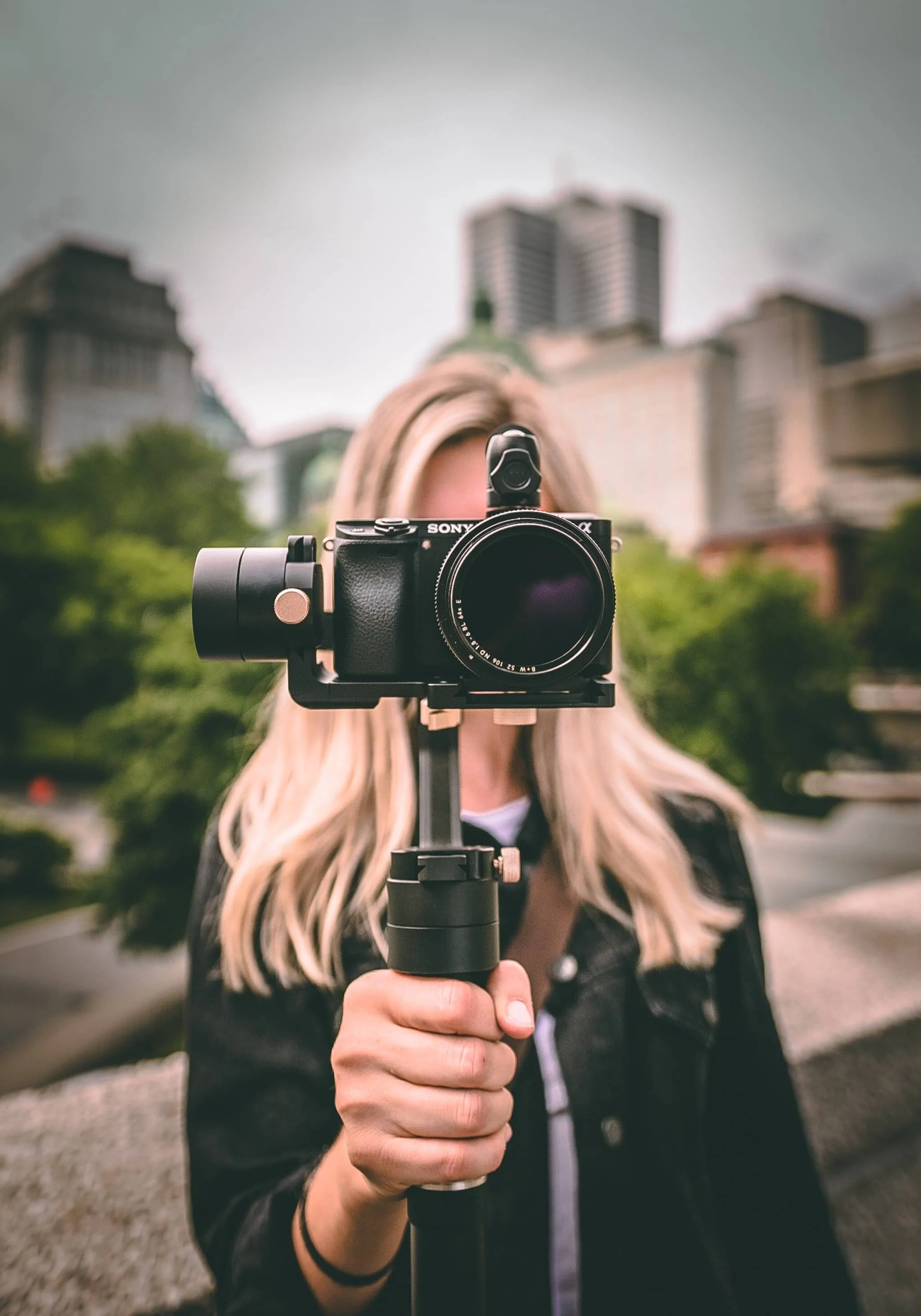 Woman holding a video camera.jpg