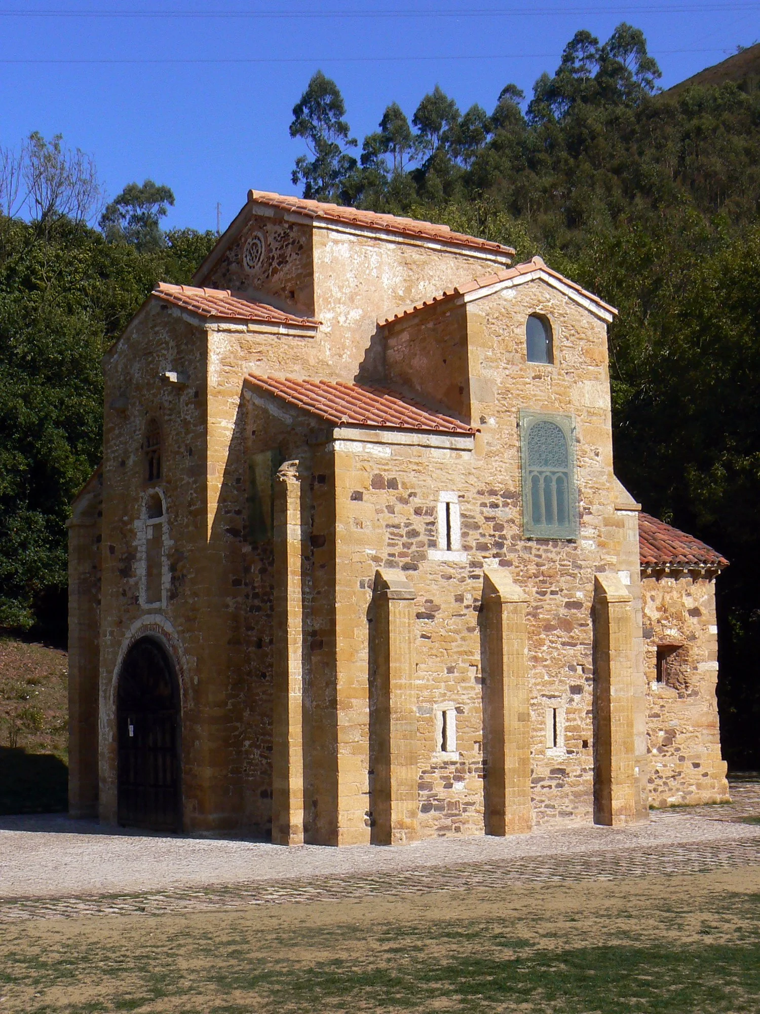 A striking church, set in Oviedo, Spain, highlighting the city's unique historical architecture.