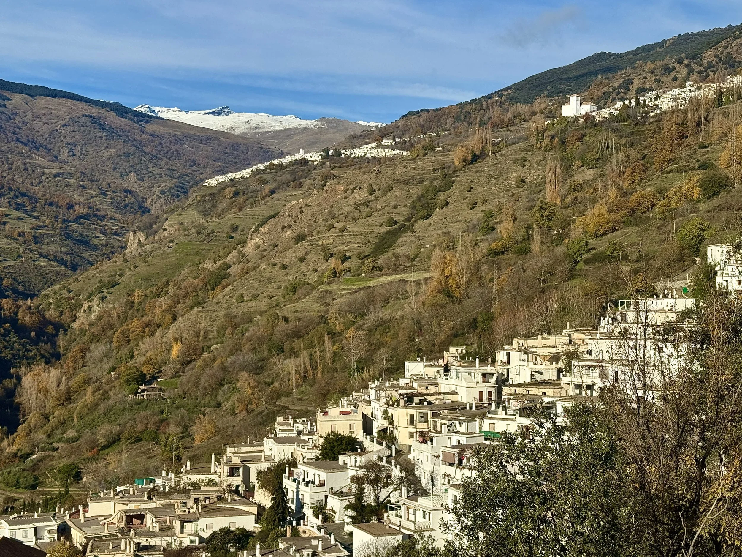 A beautiful landscape of a small village, Granada, Spain, showcasing the serene beauty of the Alpujarra region.