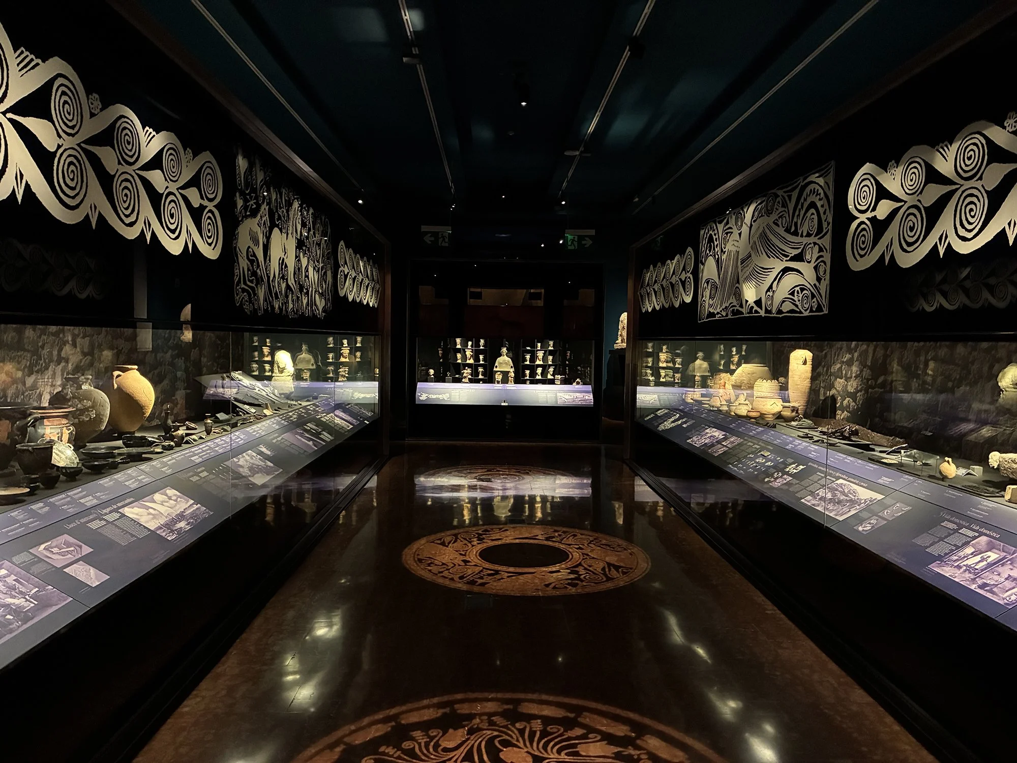 Diverse artifacts on display in a lesser-known museum in Alicante, Spain, inviting exploration of history and culture.