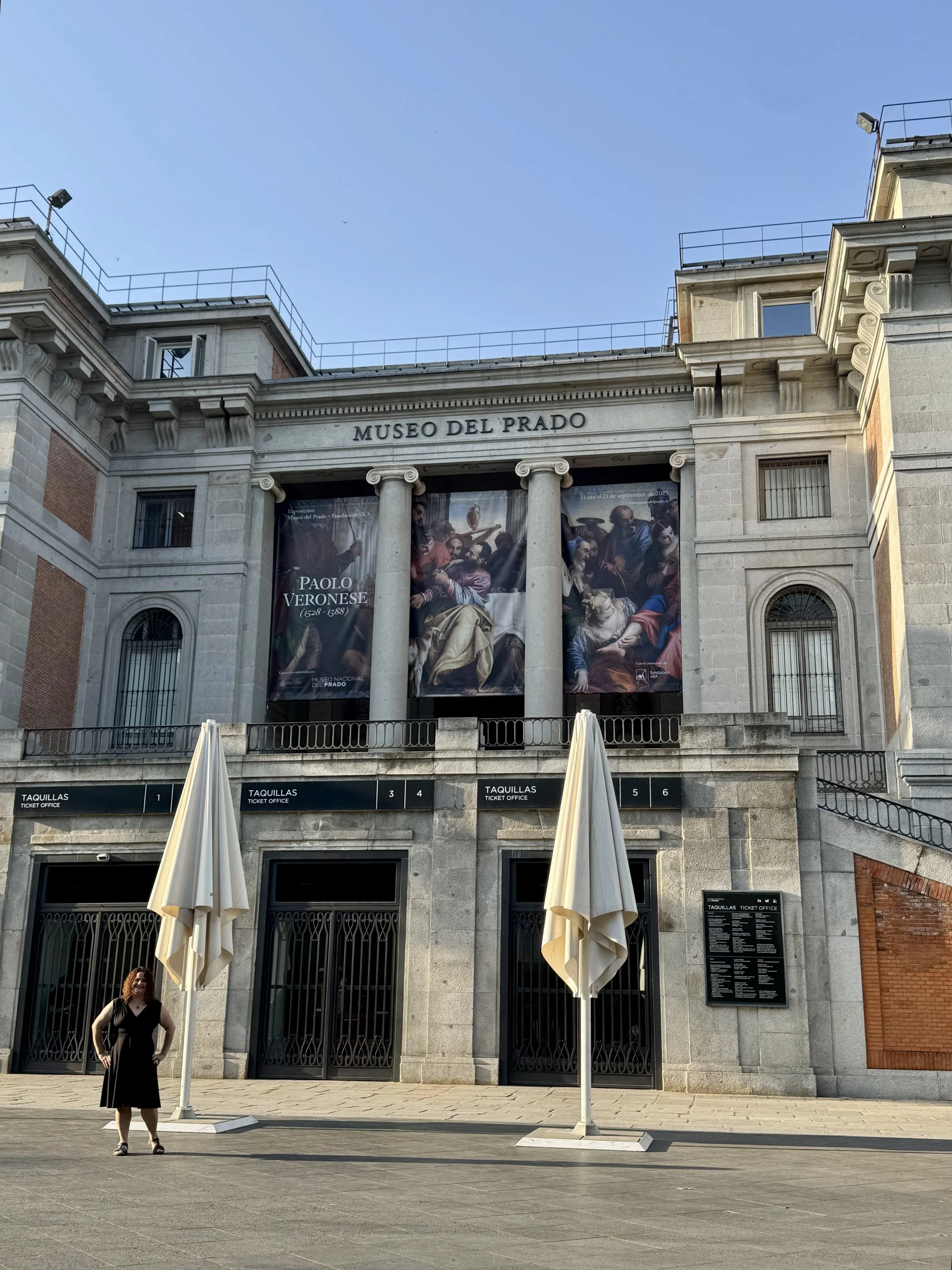 Karen outside the Prado Museum in Madrid, a hidden gem in Spain's cultural landscape.