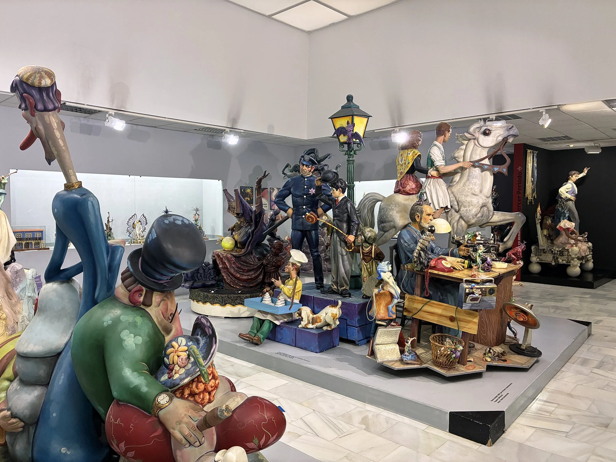 A lesser-known museum in Alicante, Spain, displaying various statues and figurines in an inviting atmosphere.