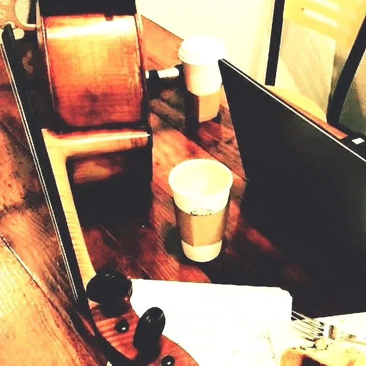 desk with laptop and coffee