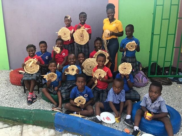 Our after school art club members proudly display the doormats the are weaving! #Ghana #Africa #educationforall #Semesteratsea #creativity #endpoverty