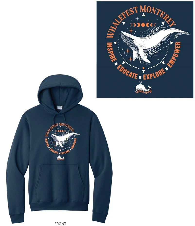 Photo of blue tshirt with a whale logo with words circling the whale Whalefest Monterey Inspire Educate Explore Empower on the front with it.  Zoomed in image of the front logo in the upper right. corner