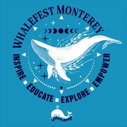 Photo of blue/teal/sapphire tshirt with a whale logo with words circling the whale Whalefest Monterey Inspire Educate Explore Empower on the front with it.  Zoomed in image of the front logo