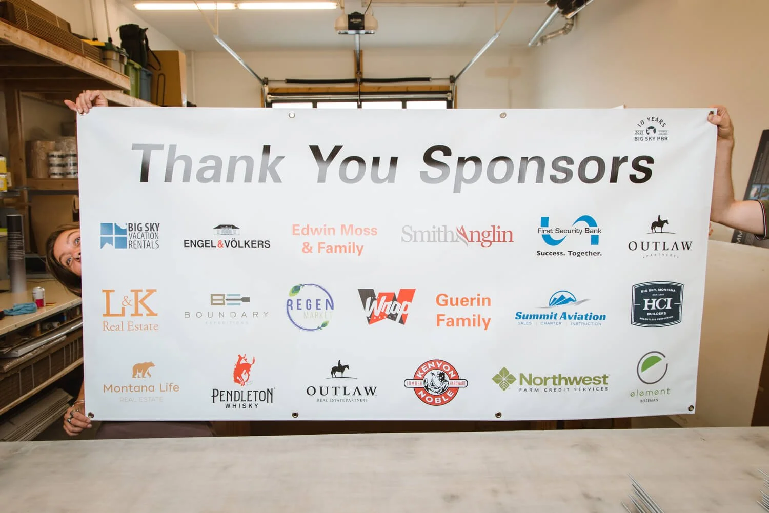 Horizontal vinyl banner thanking multiple sponsors for a Big Sky PBR event, featuring company logos in color.